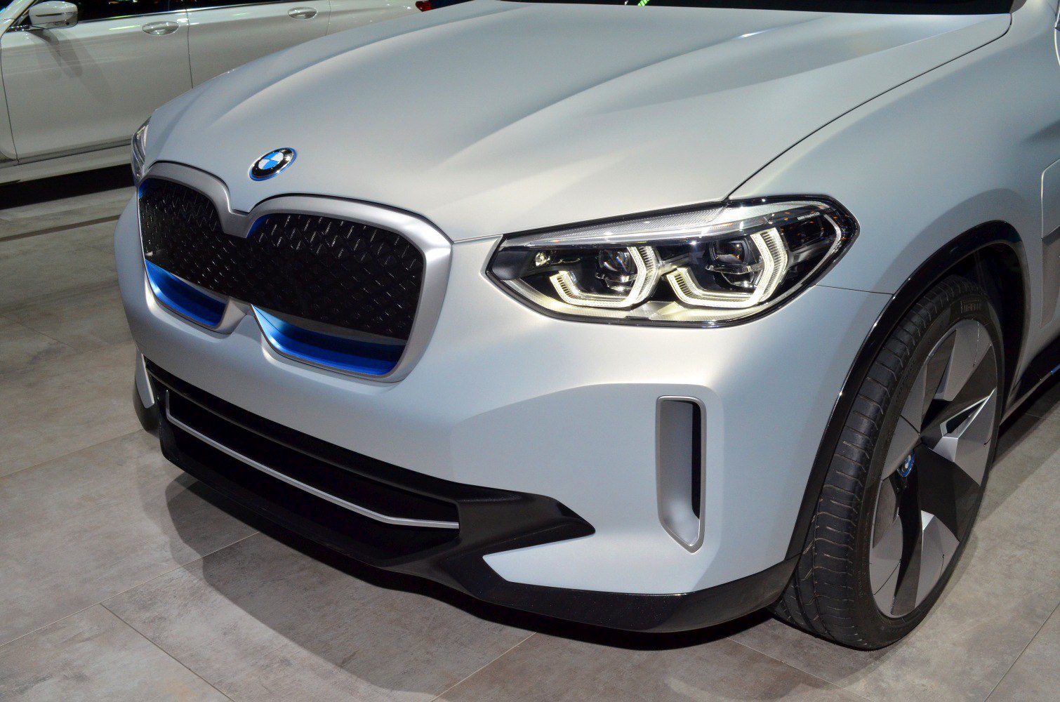 Front grille and LED headlights with blue accents