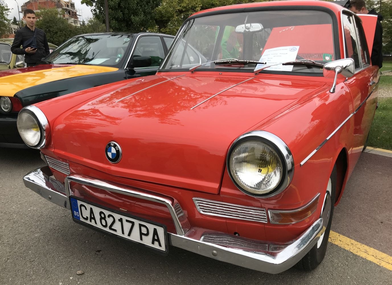 Front view with round headlights and chrome bumper