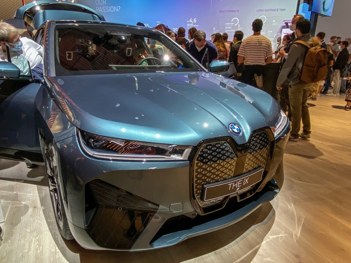 Front view with large kidney grille and sleek LED headlights