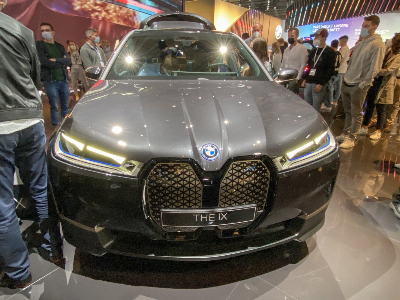 Close-up front view with large kidney grille and LED headlights