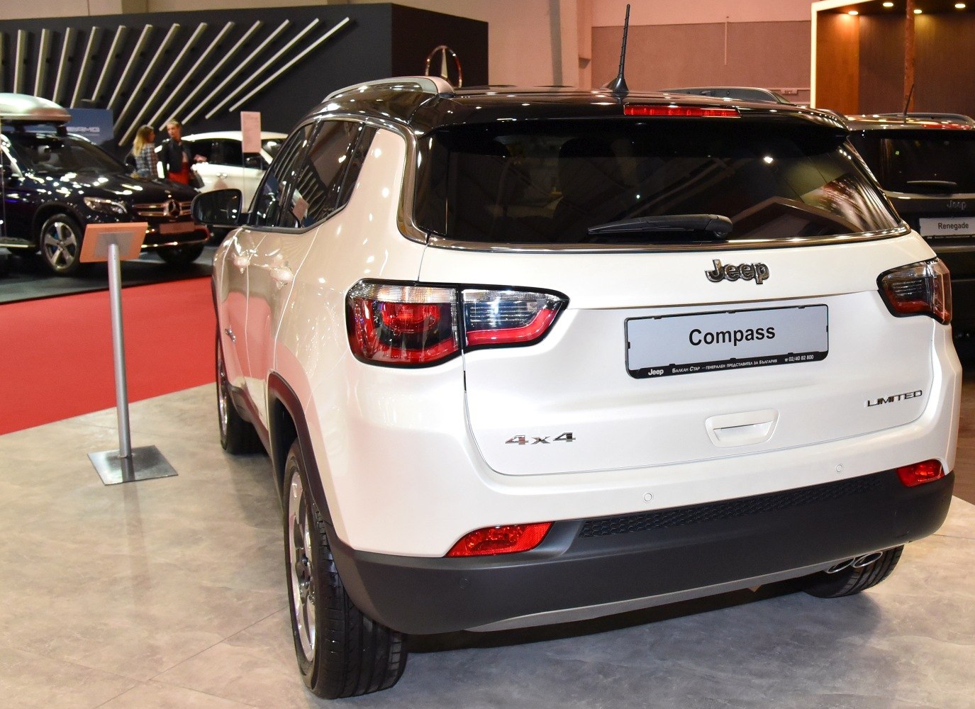 Rear view of SUV with 4x4 badge and Limited trim.