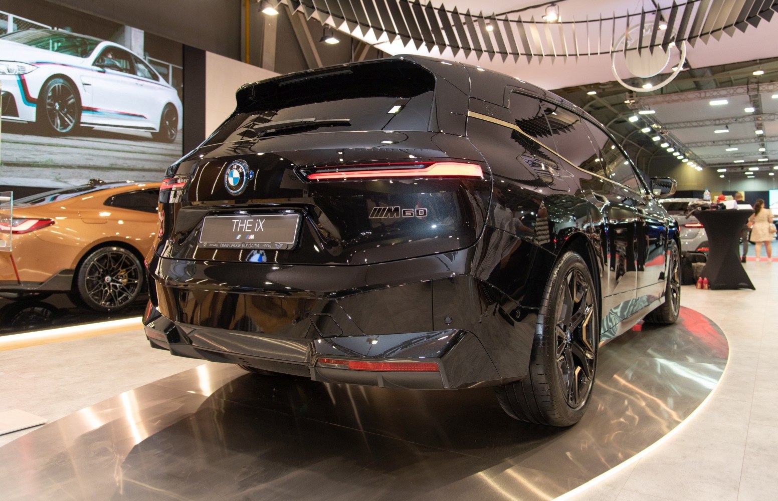 Rear view of SUV with sleek LED tail lights and glossy black paint