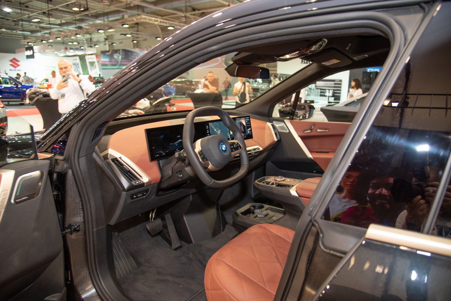 Digital dashboard with touchscreen displays and quilted leather seating