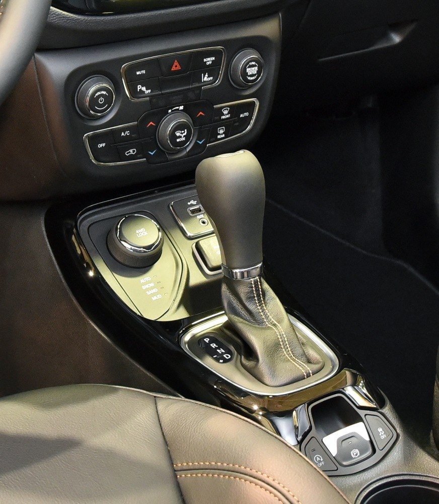 Gear shift with drive mode selector and dashboard controls