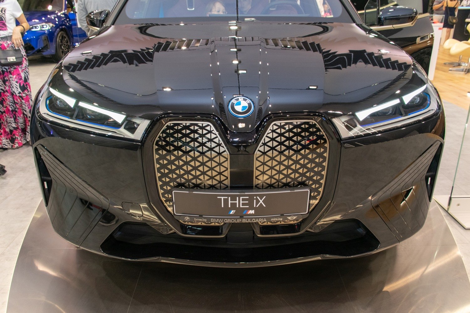 Prominent front grille and LED headlights of a sleek SUV