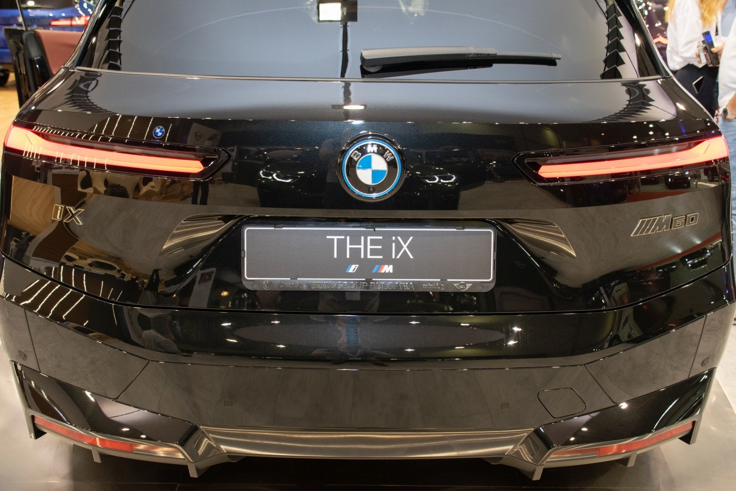 Rear view with sleek LED taillights and sporty rear design.