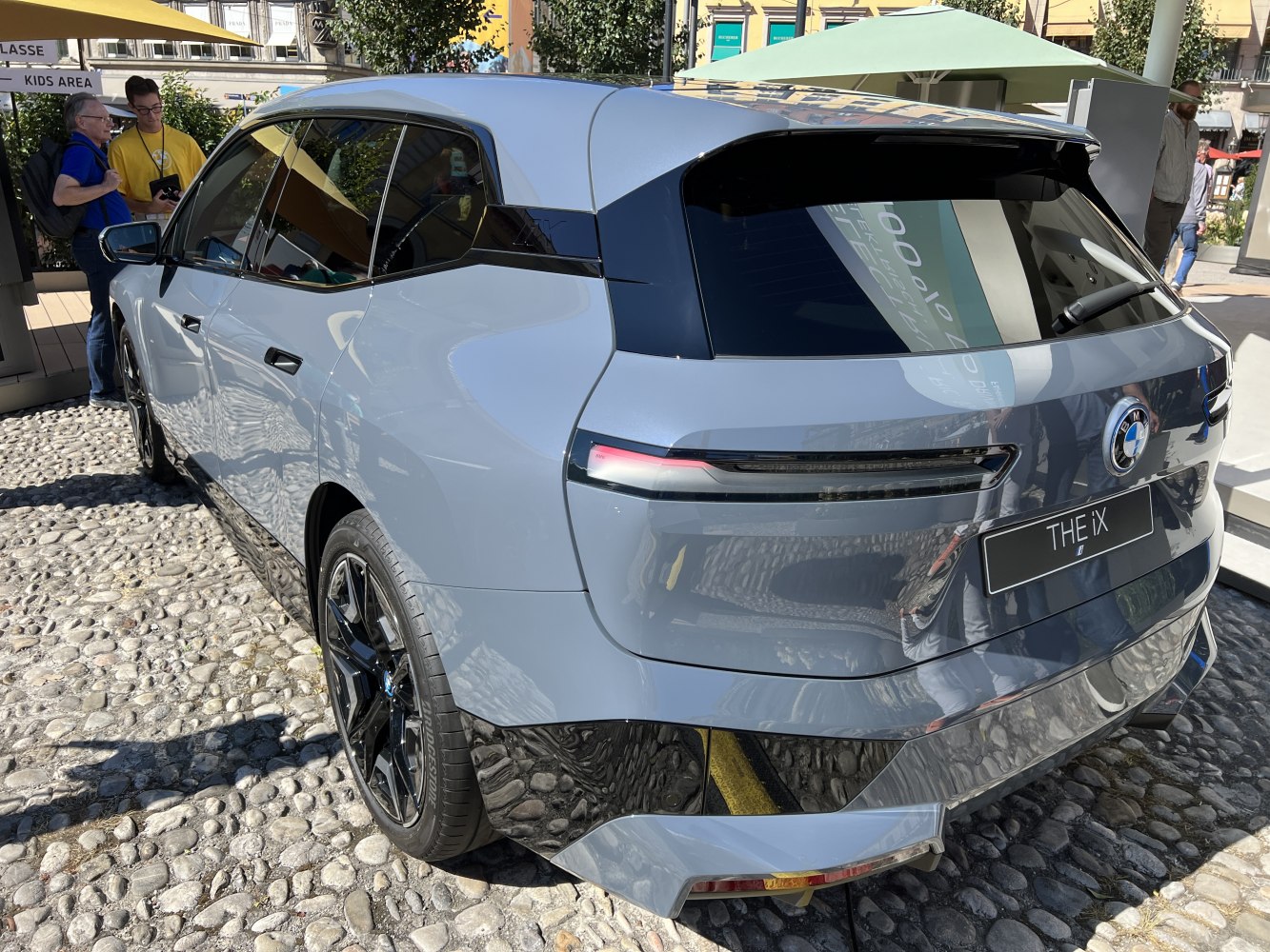 Rear exterior view with taillights and black accents
