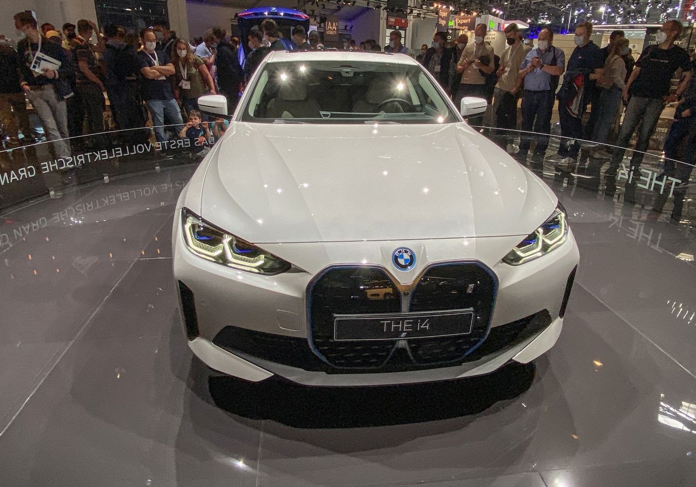 Front view with large kidney grille and sleek LED headlights