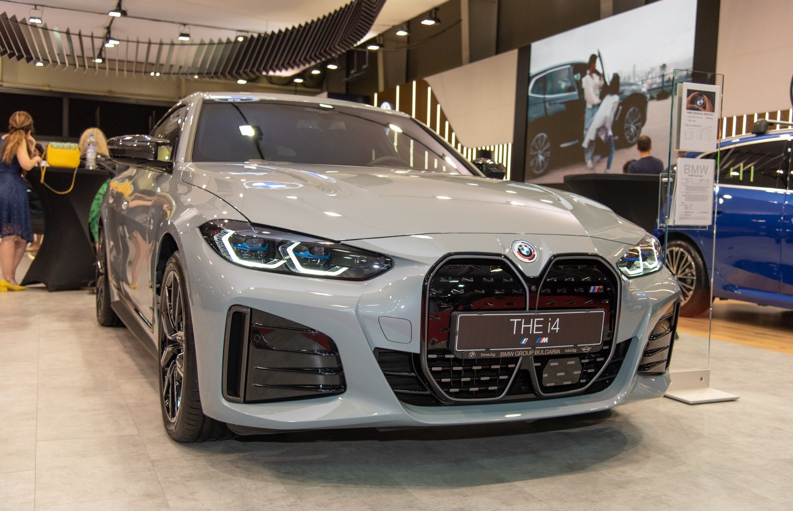 Front view featuring large kidney grille and LED headlights.