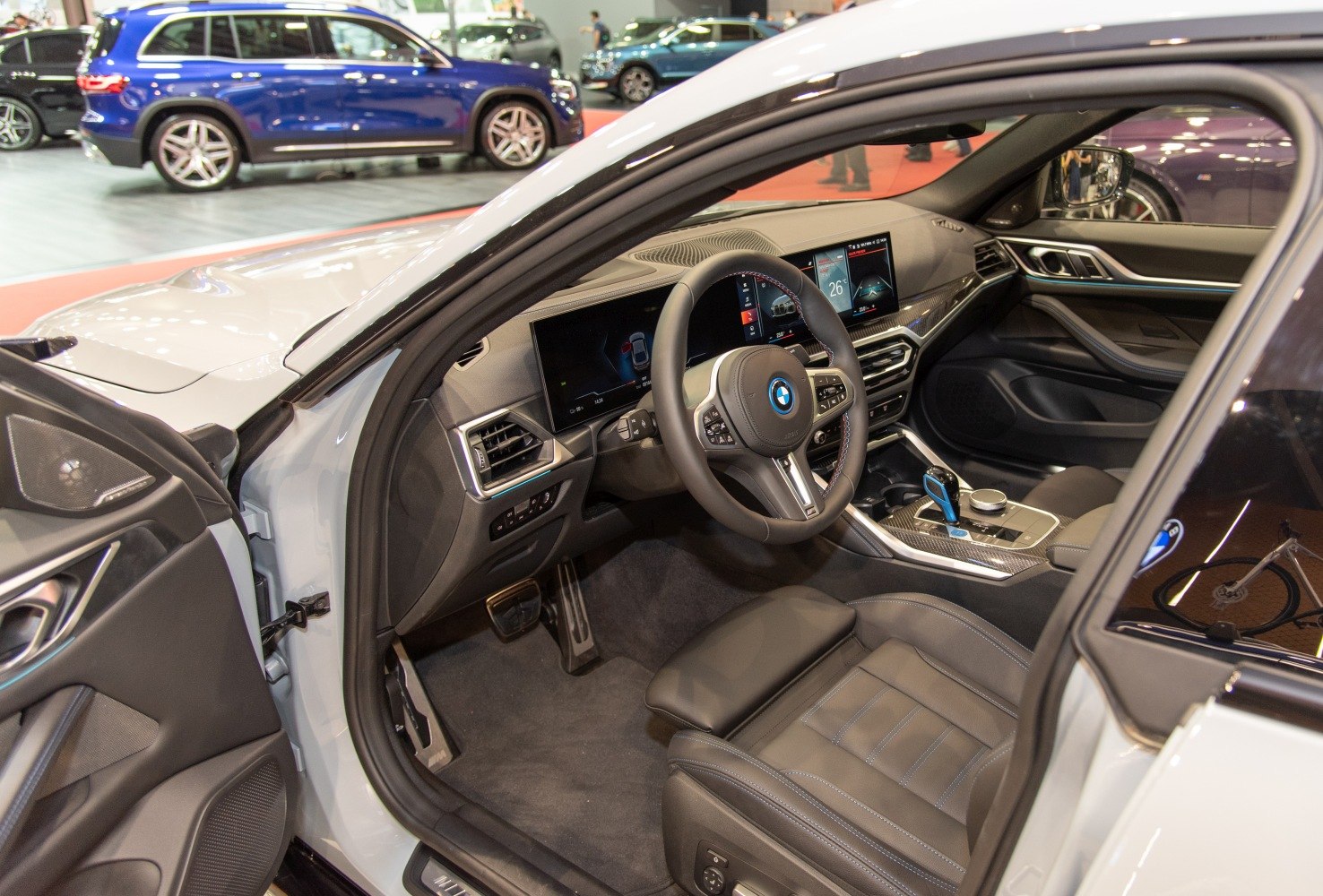 Modern dashboard and steering wheel with digital displays in a luxury car interior