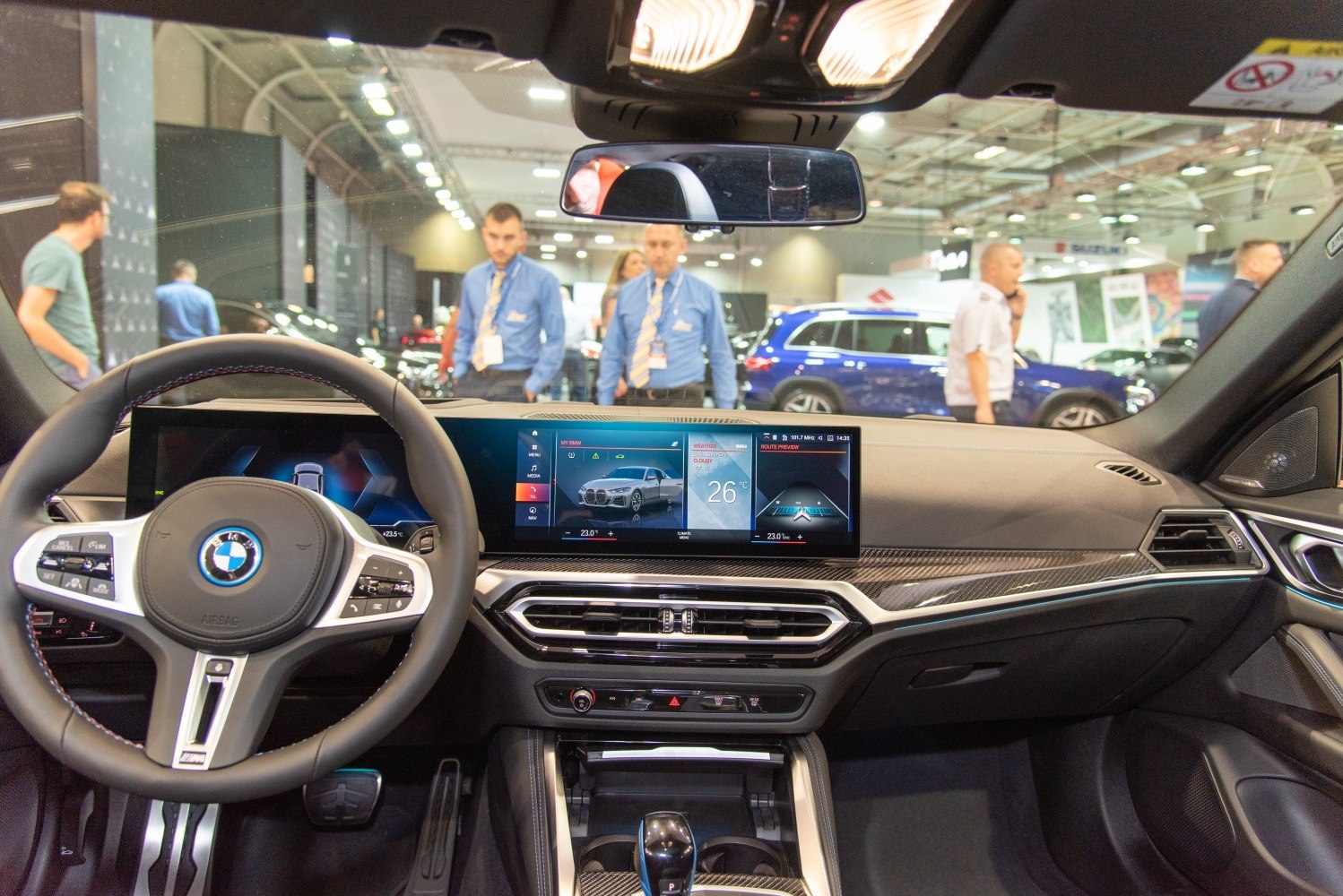 Modern dashboard and digital infotainment display with steering wheel and climate controls
