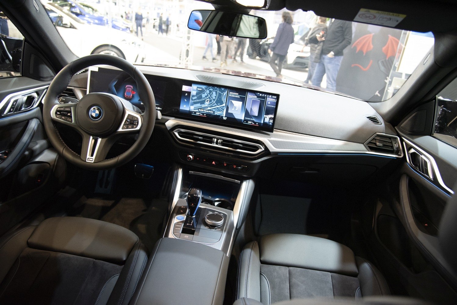Modern dashboard with digital displays and ergonomic steering wheel controls