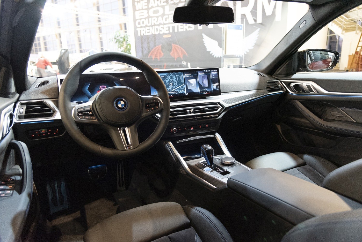 Digital dashboard and infotainment touchscreen in modern vehicle interior