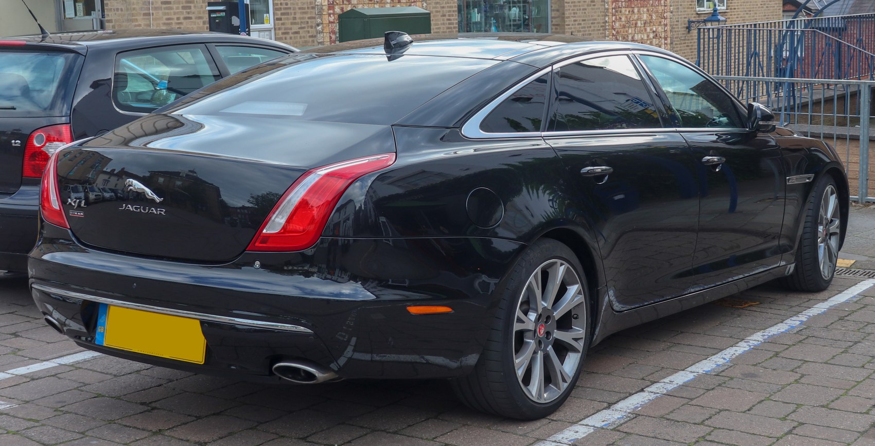 Rear view with distinctive taillights and dual exhausts