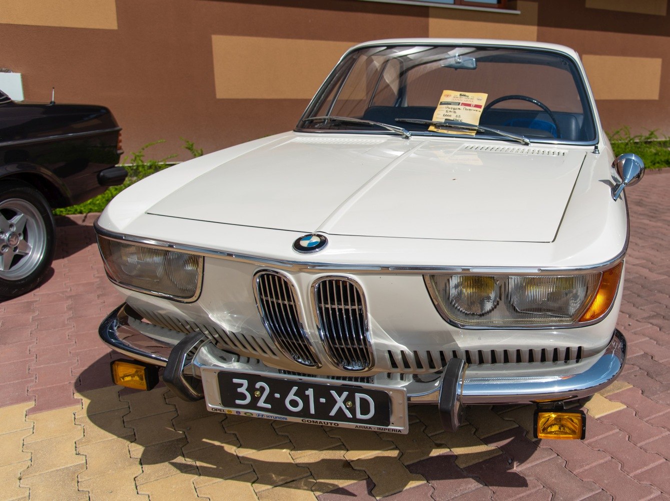Front view with kidney grille and dual headlights