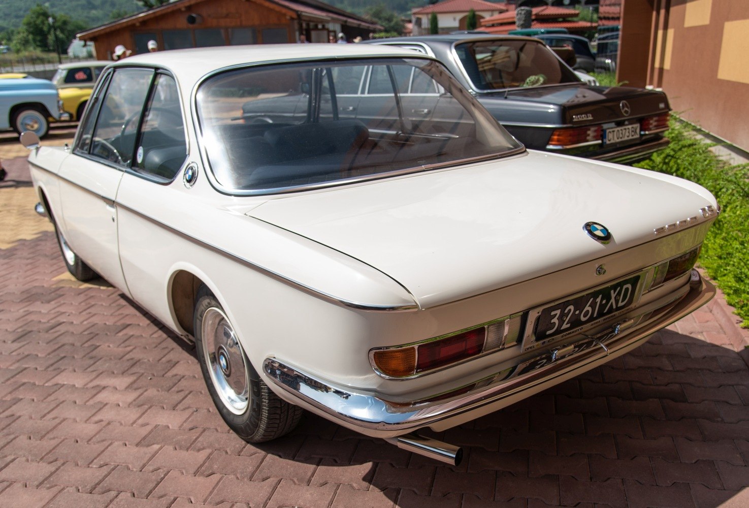 Vintage car rear with chrome bumper and classic taillight design