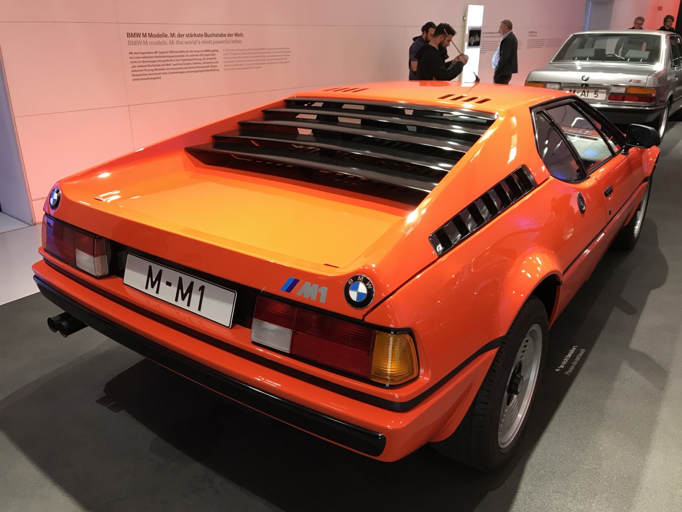 Rear view with distinctive louvers and taillights