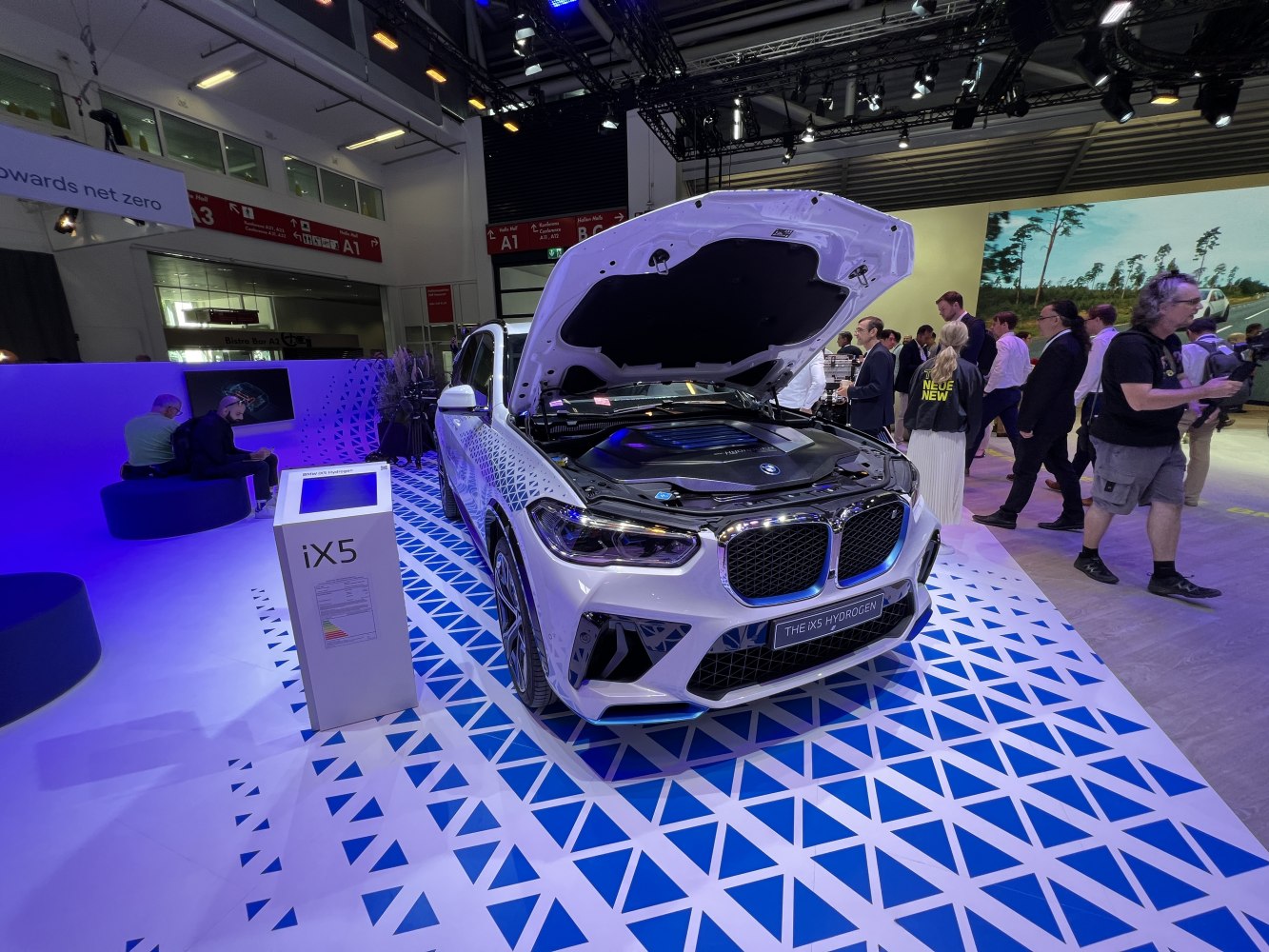 Front view of hydrogen SUV with open hood showcasing engine bay.