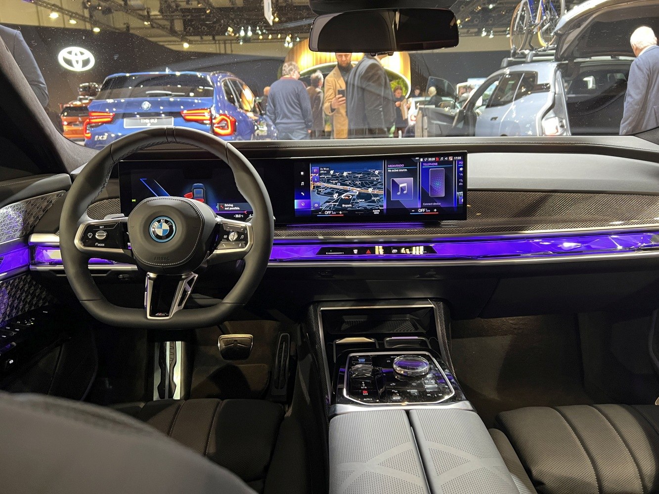 BMW interior with digital dashboard and ambient lighting