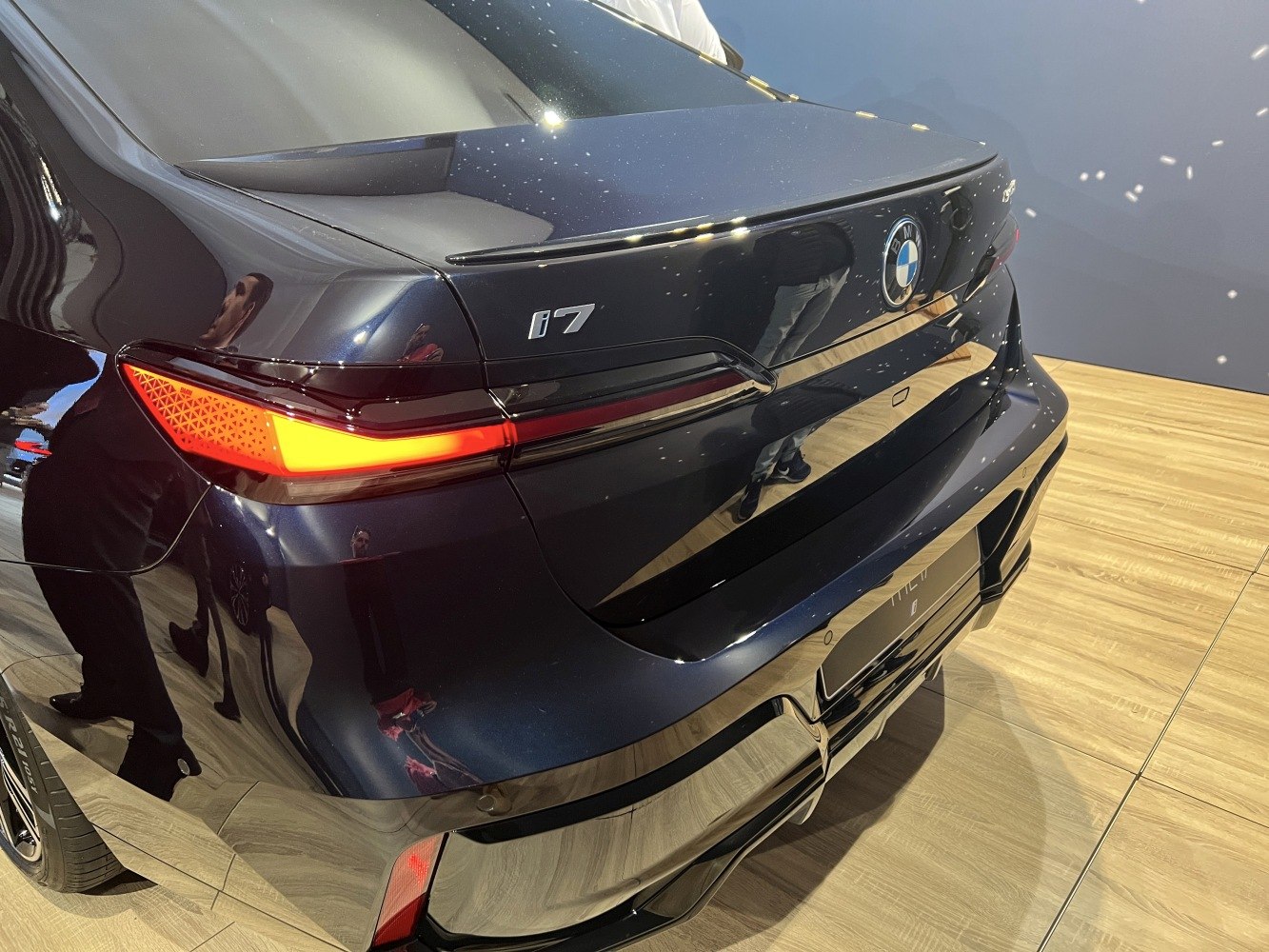 Rear view with illuminated LED taillight and sleek trunk design