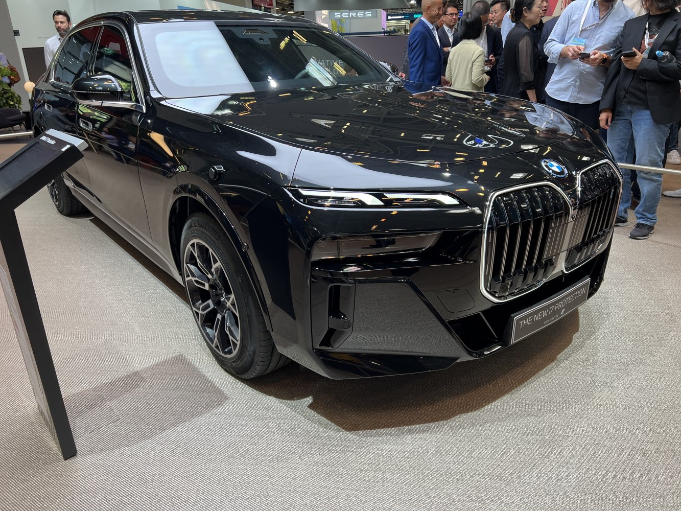 Luxury electric SUV with distinctive kidney grille and sleek LED headlights
