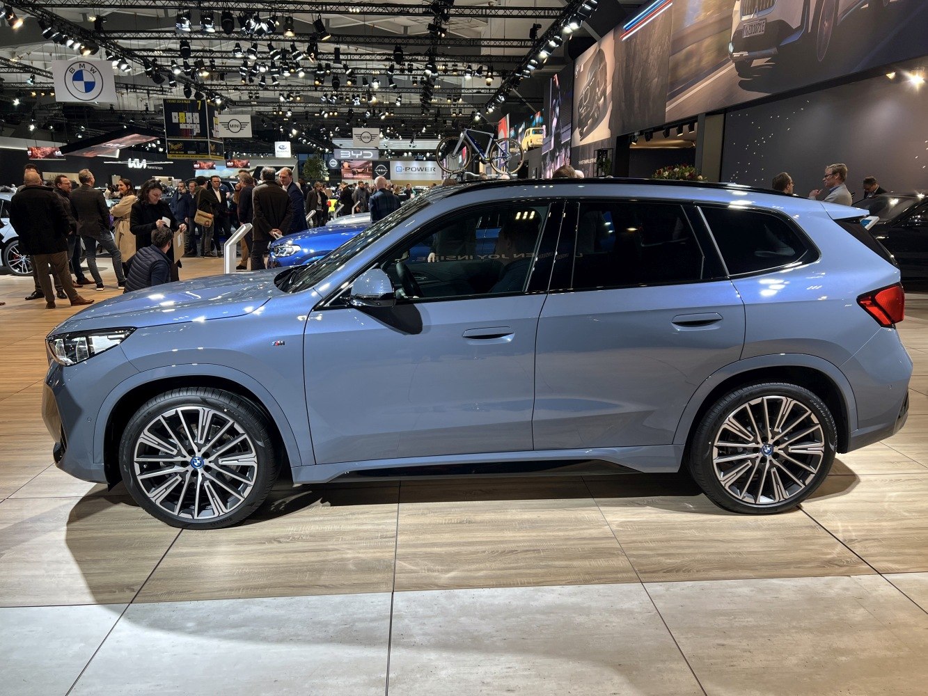 Side profile of an electric SUV with modern alloy wheels and sharp design lines