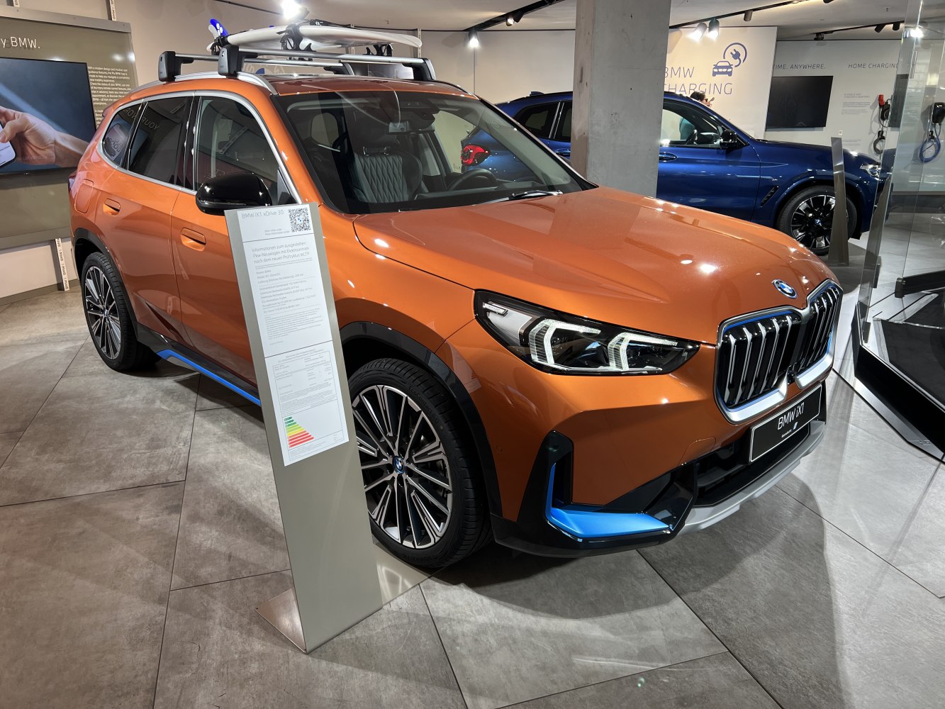 Front side view of SUV with LED headlights and roof rack