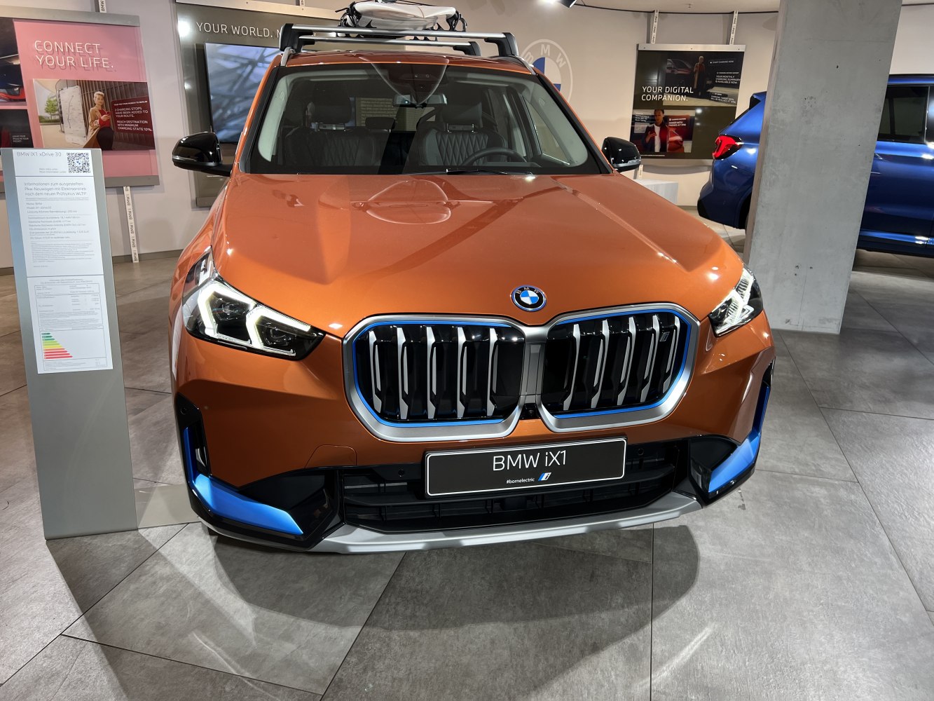 Front view with kidney grille and LED headlights in orange tone