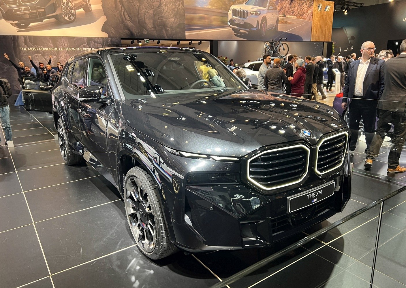 Luxury SUV front grille and sport rims close-up