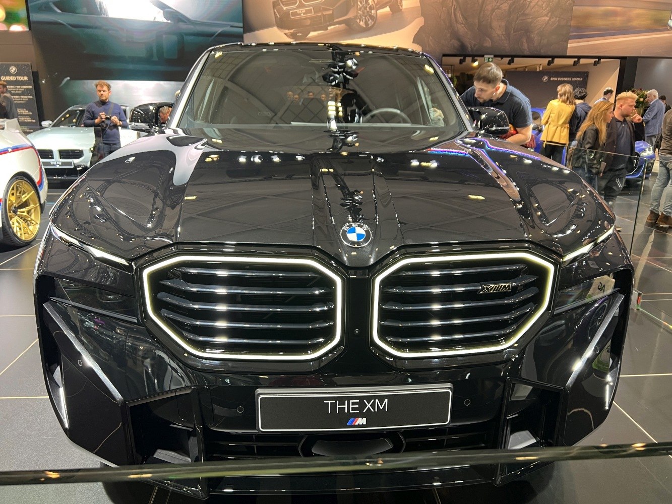 Bold front grill with LED headlights and detailed aerodynamic front bumper.
