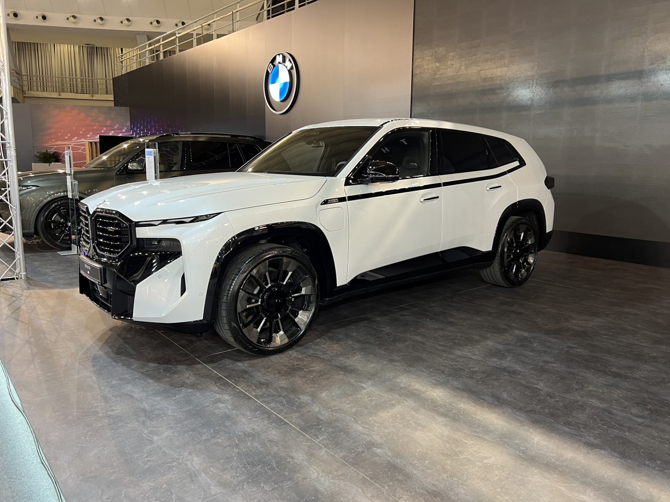 White luxury SUV with black accents and unique grille design
