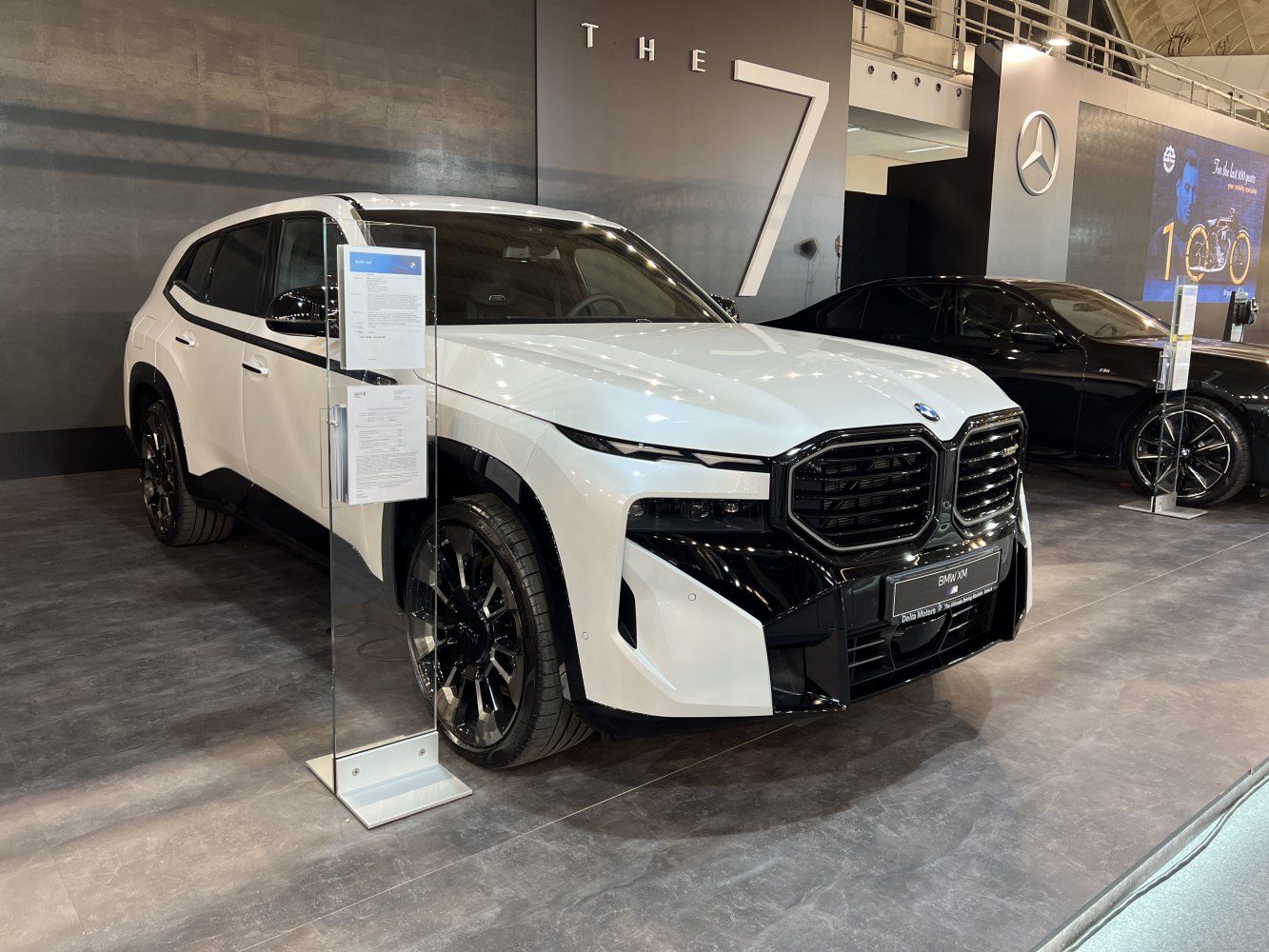 Front view of SUV with bold black grille and sleek LED headlights