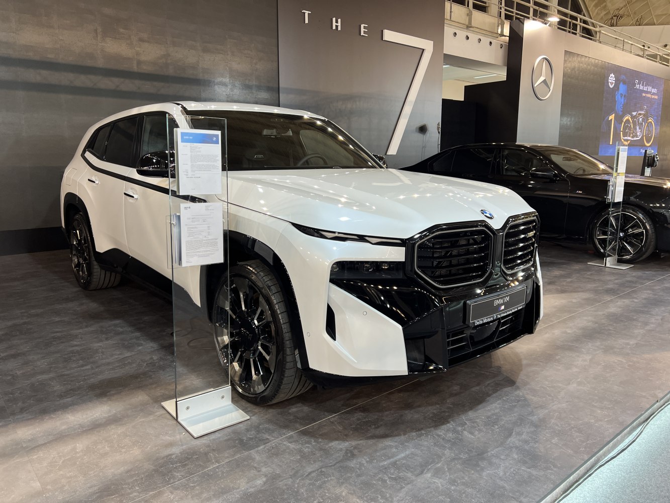 Front view of luxury SUV with bold black grille and sleek headlights
