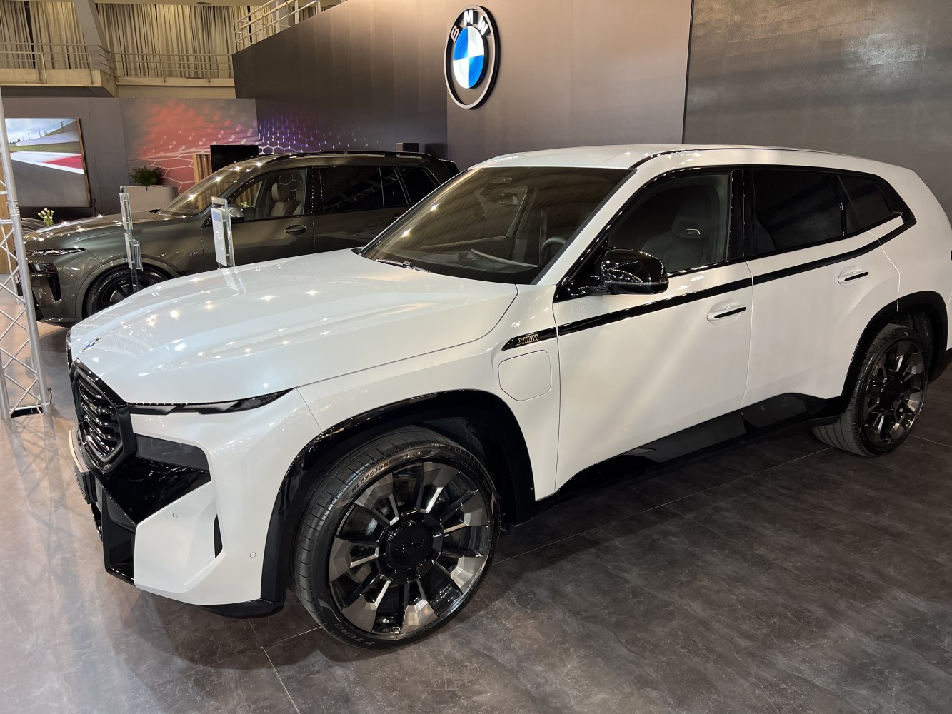 White SUV with black trim and large alloy wheels