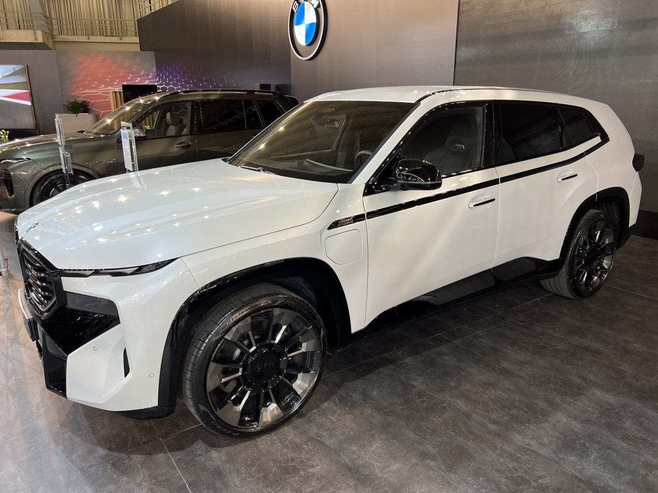 Front side view with aggressive fascia and black accented wheels