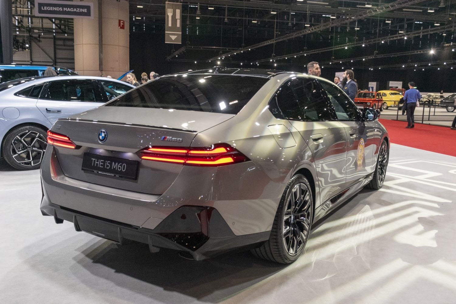 Rear view of a luxury sedan with M60 badge and LED taillights