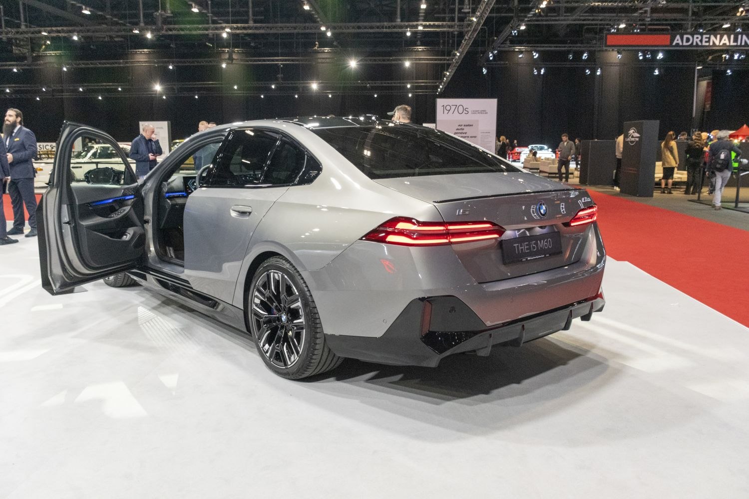 Rear view with LED tail lights and open driver door