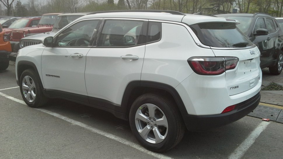 Rear side exterior with taillights and alloy wheels