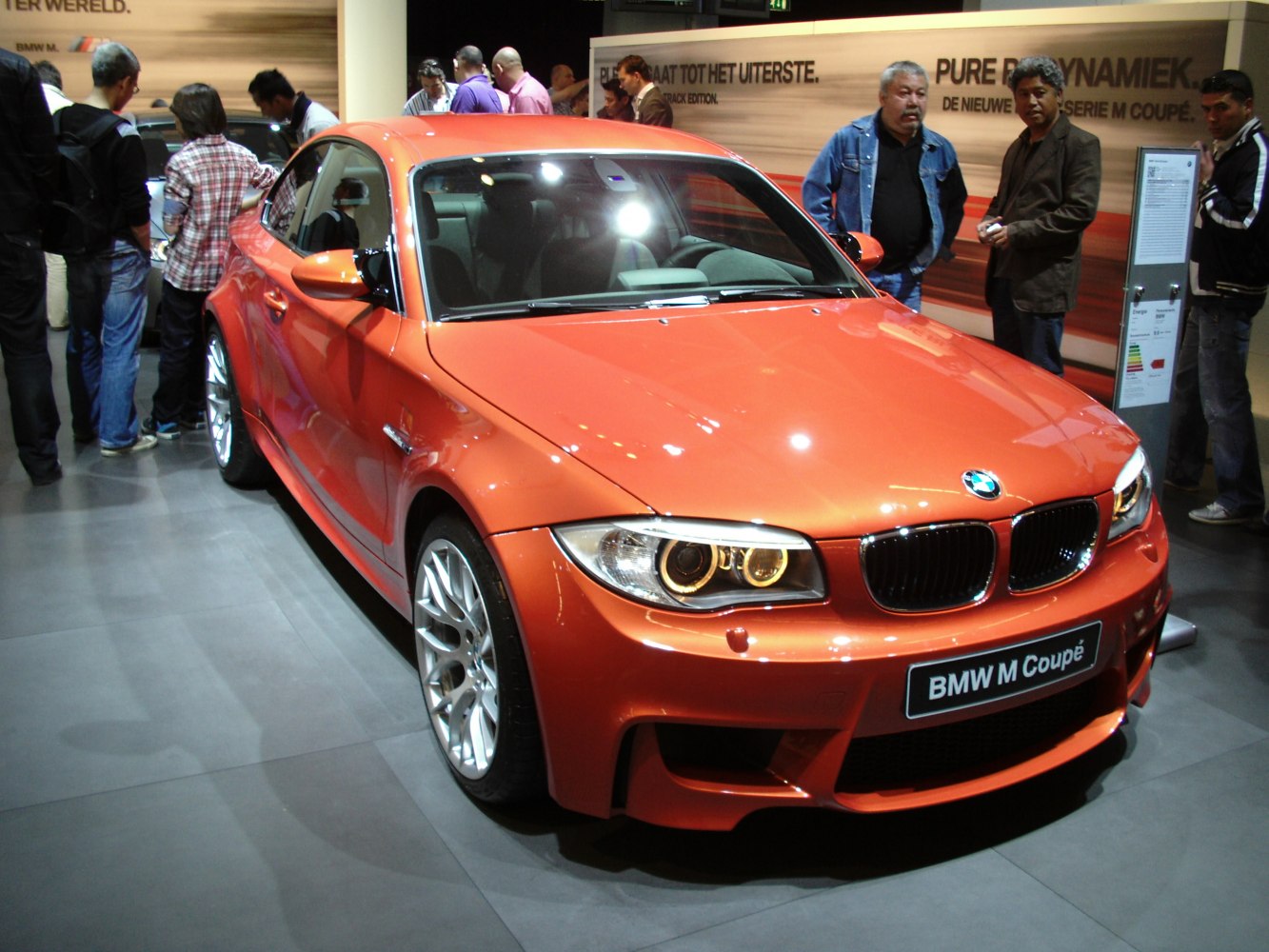Aggressive front fascia and iconic angel eye headlights on compact coupe