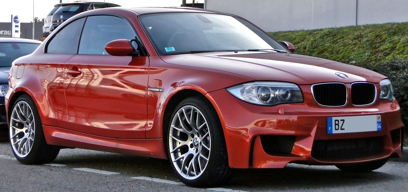 Sporty coupe with alloy wheels and aggressive front bumper