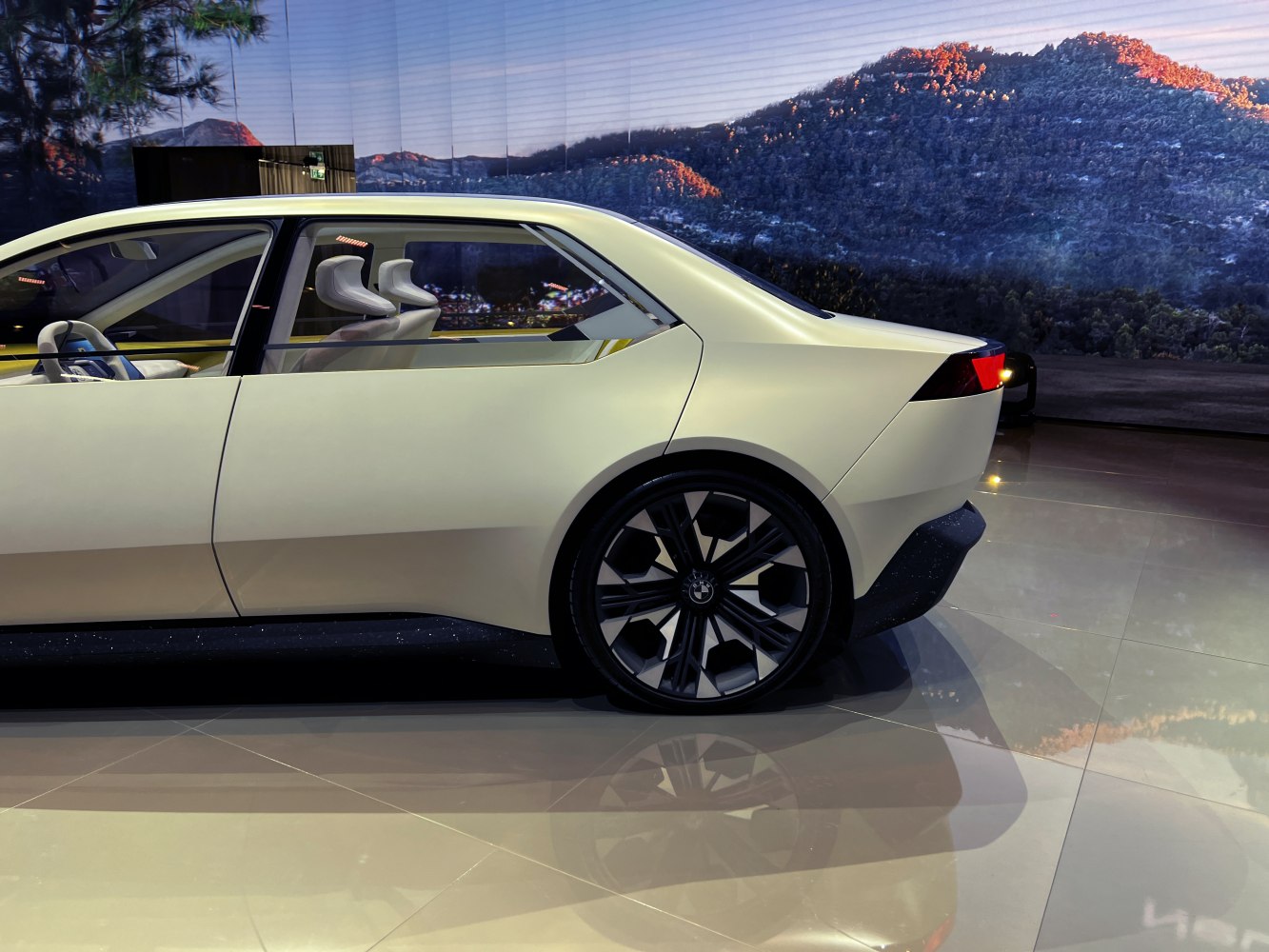 Side profile with geometric body lines and rear alloy wheel design