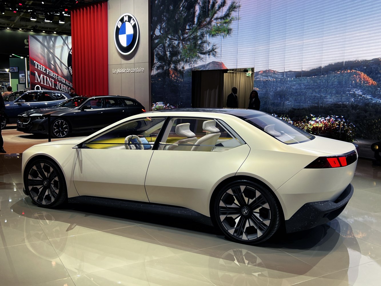 Futuristic electric sedan with sleek body and minimalist interior