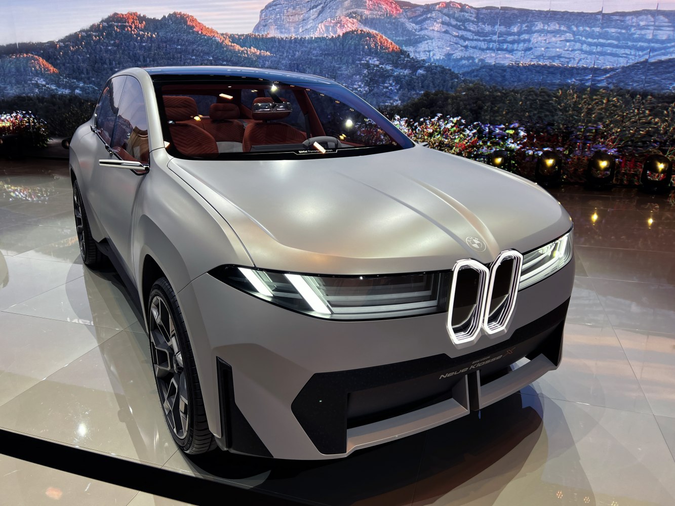 Futuristic front design with LED headlights and distinctive kidney grille