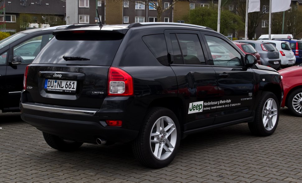 Black SUV rear and side view with alloy wheels and tinted windows