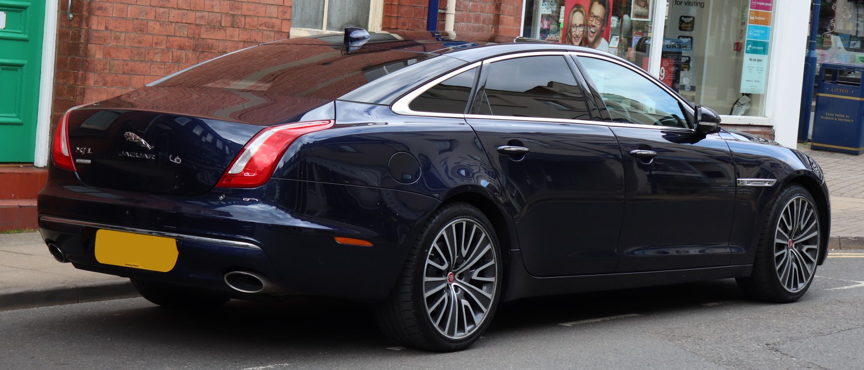 Rear side profile with distinctive taillights and alloy wheels