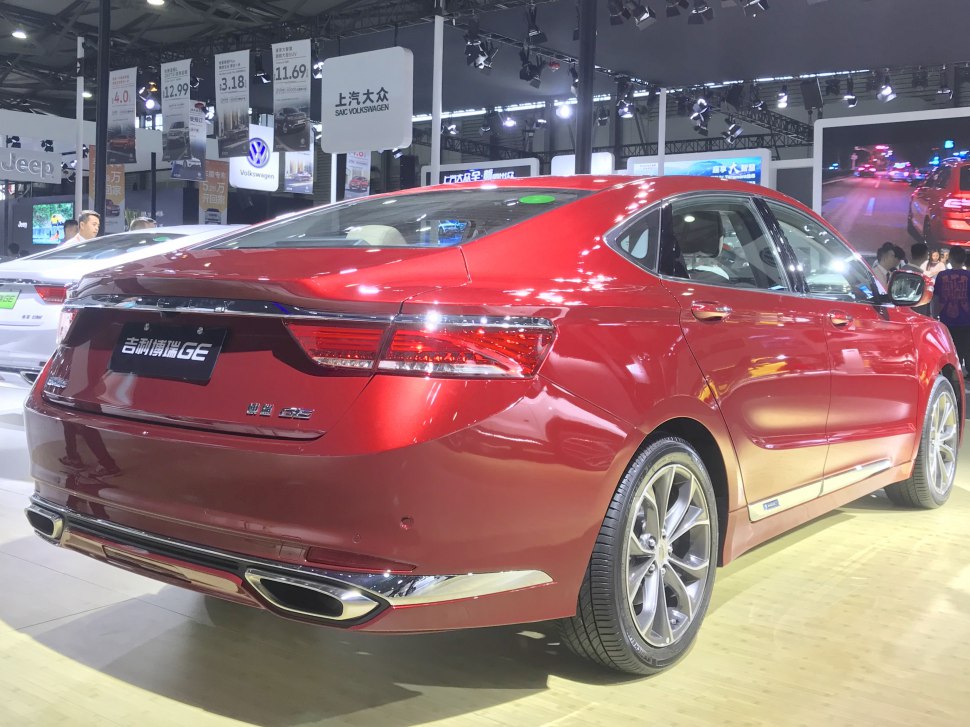 Red sedan with dual exhaust and sleek rear lights