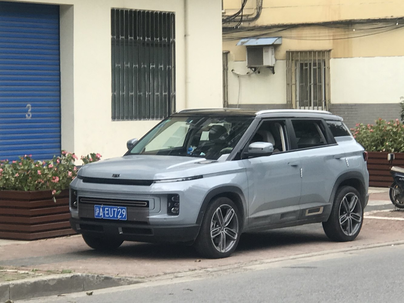 Compact SUV front-side view with LED headlights and alloy wheels