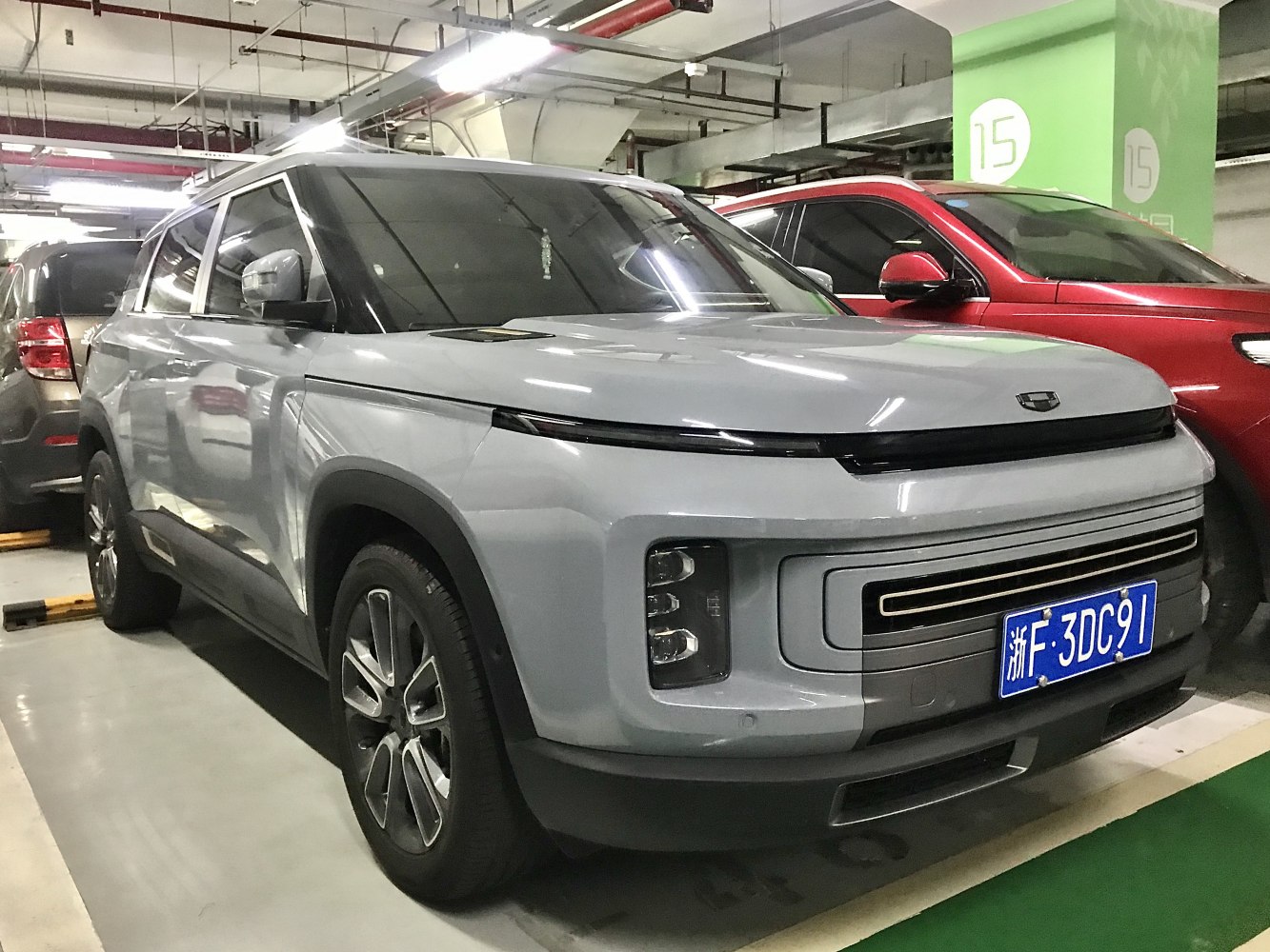 Futuristic SUV front-side with slim LED strip headlights and unique grille