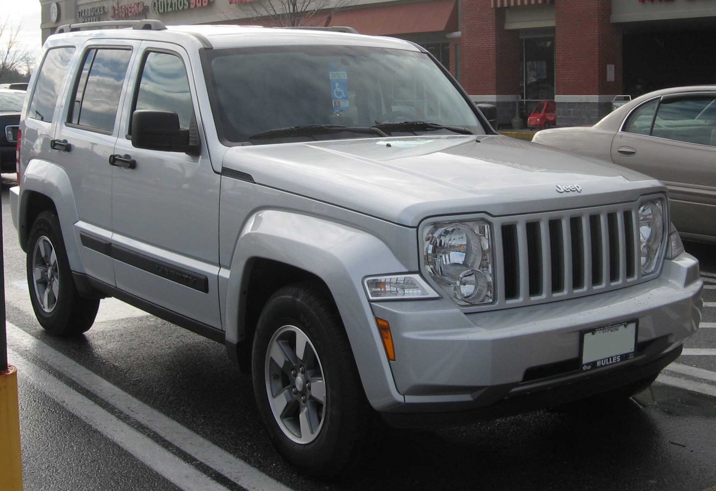 Front view of an SUV with distinctive grille and large headlights
