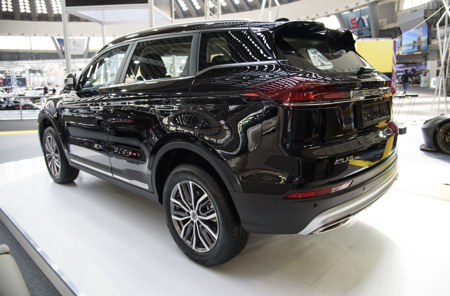 Sleek rear and side profile with modern tail lights and alloy wheels